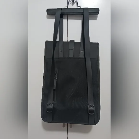 Rains Black Minimalist Backpack with Flap Closure